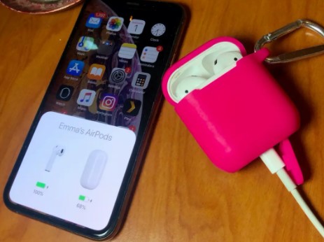 Placing Both Airpods In Charging Case