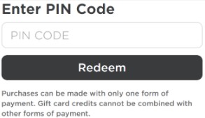 Select Redeem to add the Credit or Robux to your account